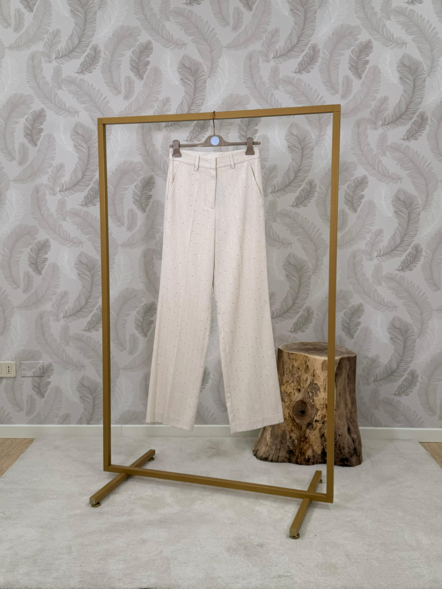 Pantalone con dettaglio luminosi